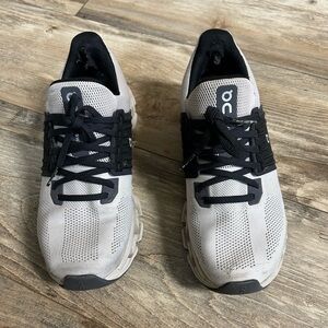 On Running Gray and Black Athletic Shoes